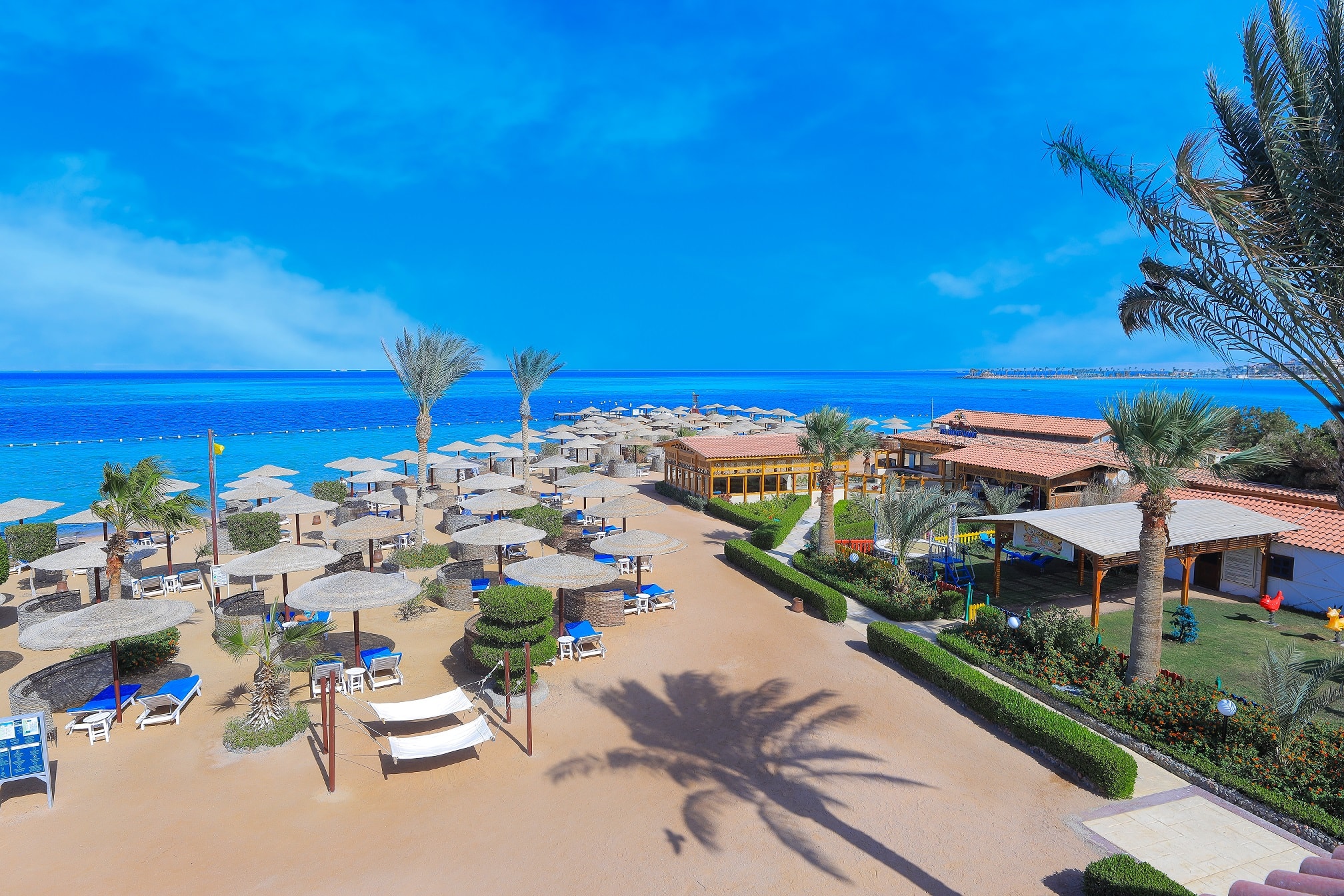 Sea Star Beau Rivage beach loungers and umbrellas
